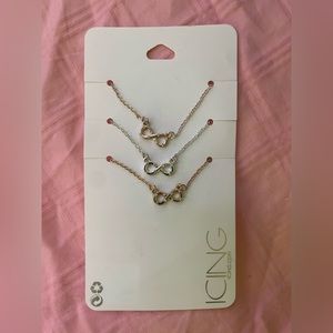 Brand new Icing brand pack of three infinity sign best friend necklace set